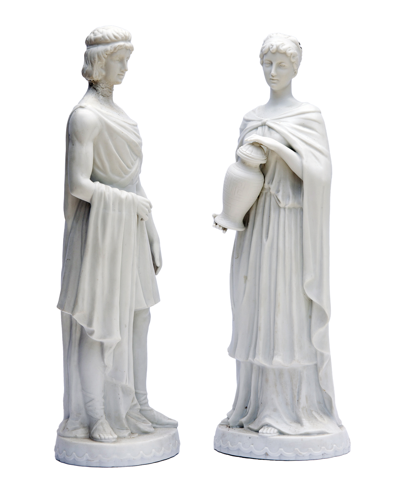 German White Bisque Figurines; a pair 1 German White Bisque Figurines; a pair