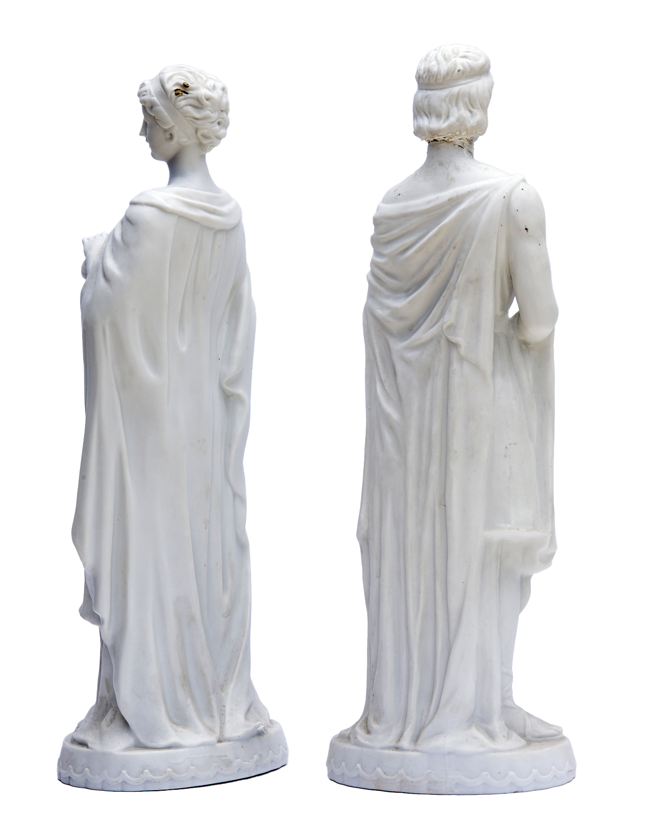 German White Bisque Figurines; a pair 7 German White Bisque Figurines; a pair